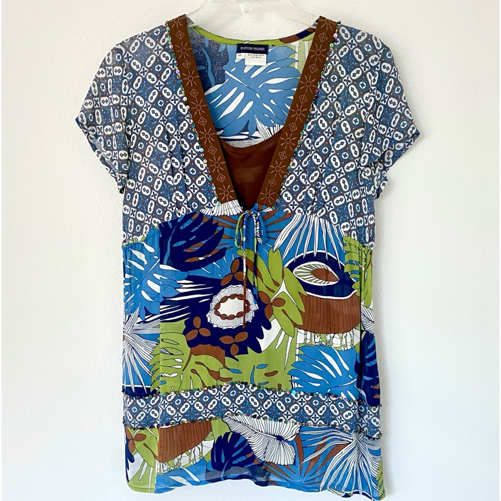 Beautiful tropical design 2 piece set top, with beads and sequins decoration.